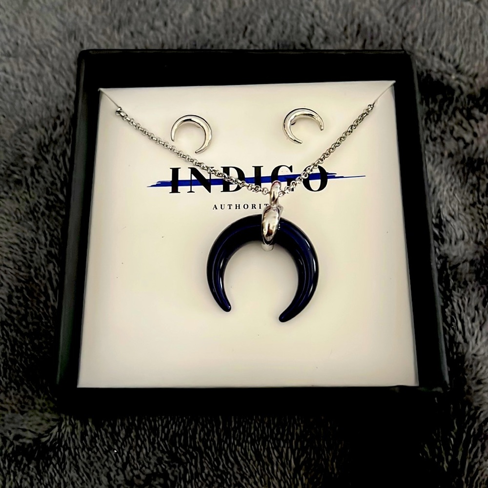 Silver crescent moon earrings and silver chain with black crescent moon pendant
